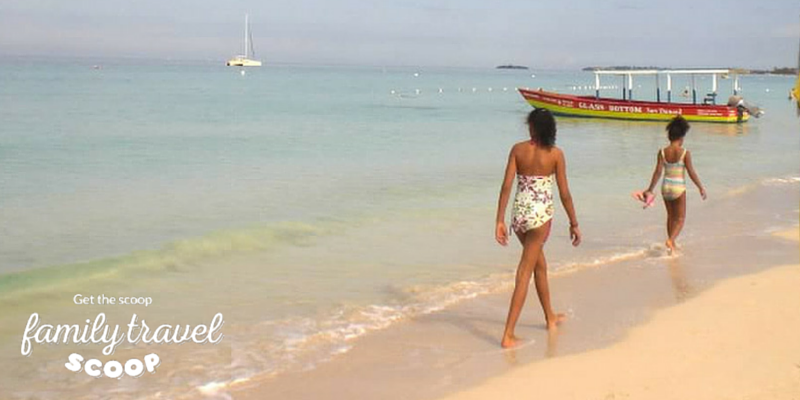 Kids walking on beach in Negril Jamaica