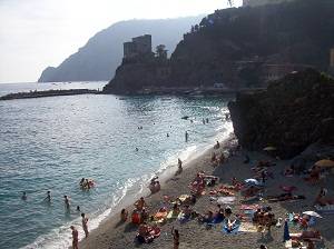 families on the beach in cinque terre