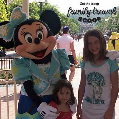 two girls with Minnie Mouse at Disney Hong Kong