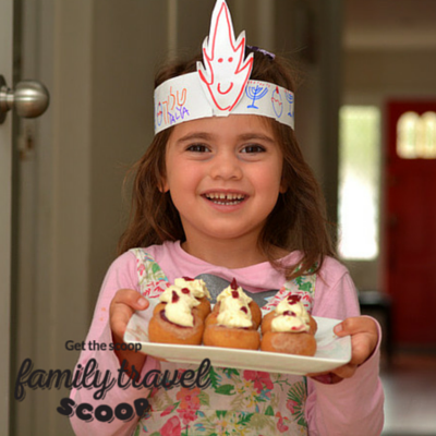 child with Israeli cakes