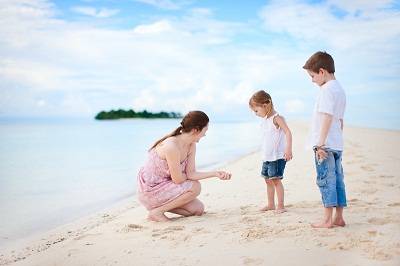 kids on the beach in the bahama