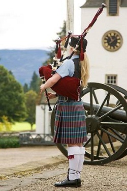 Scottish girl playing bagpipes