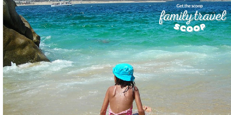 child on the beach in mexico