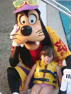 child at Disney Hong Kong with Goofy