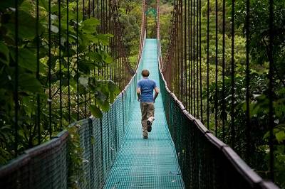 teen boy on bridge in costa ric