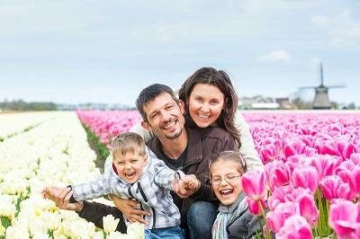 family in the Netherlands with tulips