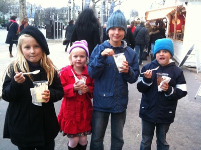 kids enjoying icream and chocolate in paris