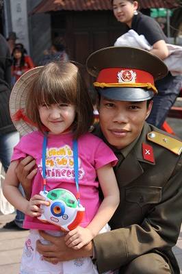 tourist girl in Vietnam with police officer