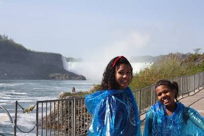 children in front on niagara fall