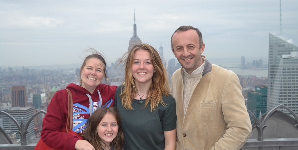 family on top of the rock